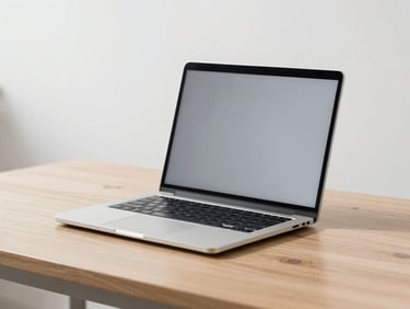 A sleek silver laptop open on a minimalist wooden desk, soft natural light, sharp focus, professional setup