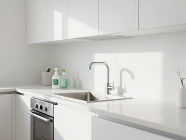 Sparkling clean, minimalist kitchen counter with stainless steel appliances reflecting natural light, eco-friendly cleaning tools visible, sharp focus, bright high-key interior.