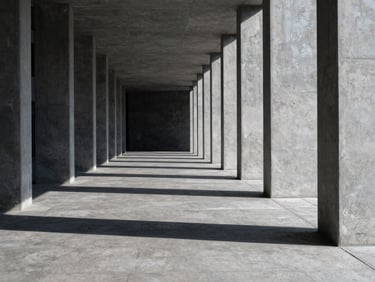 Wide environmental shot of an empty modern architectural space with strong linear perspective, concrete pillars, hard directional daylight casting crisp shadows
