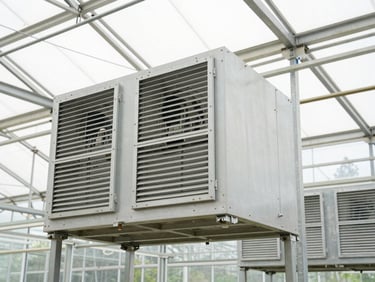 Detailed shot of automated ventilation gears and louvers within a greenhouse structure, functional, industrial architectural photography, bright daylight.