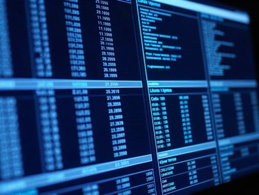 Extreme close-up of a high-contrast terminal screen displaying complex wireframe data, glowing blue, deep shadows, tactical aesthetic