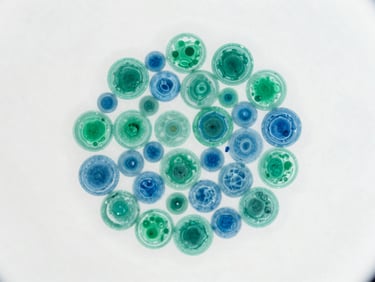 Microscopic view of glycated cells under high-key sterile laboratory light, sharp emerald and sky blue accents, showing cellular damage and oxidative stress.
