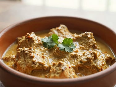Close-up of a single portion of butter chicken in a rustic ceramic bowl, with a small sprig of cilantro, ready to be reheated, soft natural light, warm tones, 35mm