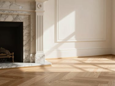 Close-up of elegant herringbone parquet floor meeting a marble fireplace, warm afternoon sun casting soft window shadows, minimalist luxury setting