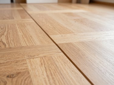 Close-up of clean parquet floor joints, warm oak wood texture, natural daylight highlighting the precise craftsmanship