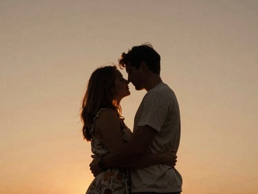A couple embracing under a warm sunset, backlit silhouette, authentic connection, cinematic frame.