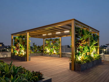 A high-end architectural rooftop garden in New Delhi with custom wooden decking, a structural gold-trimmed pergola, and lush automated vertical gardens at twilight.