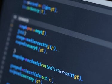 Close-up of structured code blocks on a dark screen, cool blue highlight, sharp studio lighting