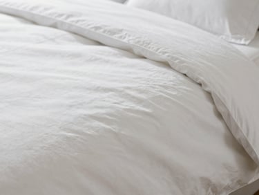 Extreme close-up of 500 TC white luxury bed linen, macro shot showing perfect thread density, soft morning daylight, 35mm