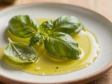 Macro close-up of vibrant green olive oil pooling on a rustic ceramic plate, torn basil leaves and coarse salt crystals visible, warm side-lighting, shallow depth of field
