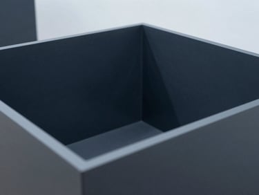 Technical overhead view of structured workspace layout, desaturated navy tones, sharp focus