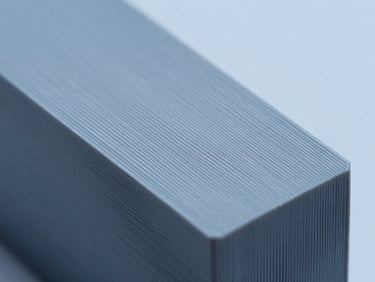 Macro close-up of a high-precision 3D-printed prototype layer, showing clean technical polymer lines under crisp cool studio lighting.