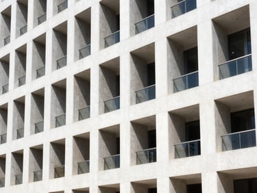 Crisp architectural photography of a modern corporate building exterior in Irapuato, sharp geometric lines, bright natural daylight, 35mm
