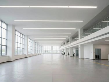 Wide-angle shot of a clean industrial facility interior, professional interior architectural lighting, symmetrical lines, 35mm