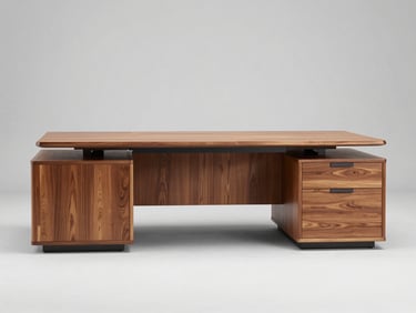 Wide straight-on studio photograph of a solid wood executive desk on a plain light gray background, bright studio strobe lighting, clean product shot showing full surface and drawer unit, no people