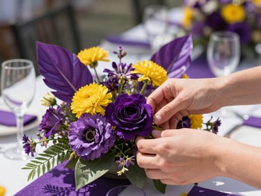 Medium-close action shot of hands carefully arranging a vibrant event centerpiece, bright natural daylight, royal purple accents, 35mm lens