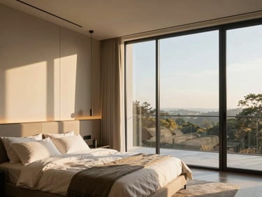 Premium modern master bedroom with large glass windows, warm golden-hour lighting, minimalist aesthetic, 35mm lens
