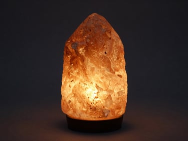 Glowing Himalayan salt lamp in a minimalist interior, warm internal illumination, emphasizing natural beauty.