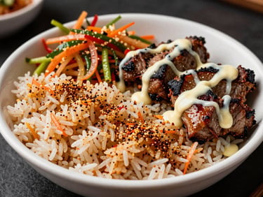 Vibrant street food bowl filled with seasoned rice, colorful spicy slaw, and grilled meats drizzled with garlic aioli.