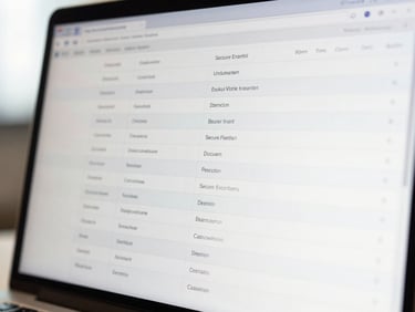 Detailed shot of a blockchain ledger interface on a monitor, showing secure transactions and audit trails, high-key studio lighting, crisp details, professional corporate realism