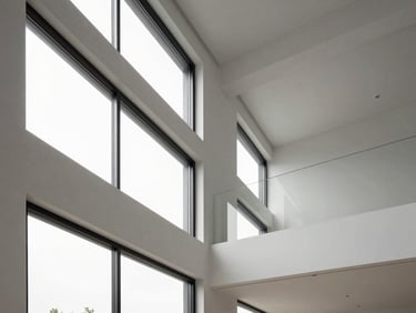Architectural interior photography of a modern ADU build with clean lines and large windows, sharp focus, 35mm lens, high-end editorial style.