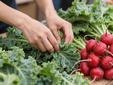 Hands arranging vibrant green organic kale and bright red radishes on a market stall, natural daylight