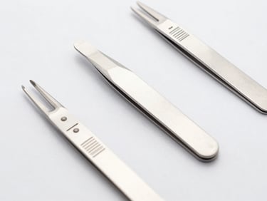 Overhead technical layout of professional beauty tweezers, metallic silver tones, crisp studio reflections, high-key lighting.