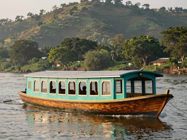 A traditional wooden cruise boat sailing on the calm Godavari river, lush green hills in the soft-focus background, warm afternoon light, 35mm