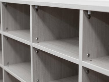 Close-up of organized cabinet interiors showing sleek brushed aluminum frameworks and precision hardware