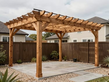 Wide shot of a finished timber pergola in a residential backyard, overcast daylight showing beam joinery and post footings, gravel and stone patio beneath, full property context visible, no people