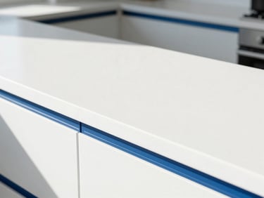 Spotless modern kitchen counter with clean white surfaces, sunlit daylight, high-key photography, macro detail.