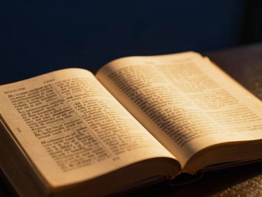 Close-up of an open holy scripture glowing under warm volumetric stage lighting, deep navy background, shallow depth of field.