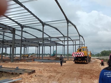 Heavy-duty structural steel fabrication and vibration-resistant foundation construction for industri