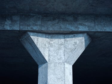 Architectural detail of a brutalist concrete support beam, strong shadows, cold blue light, symmetrical composition, 35mm