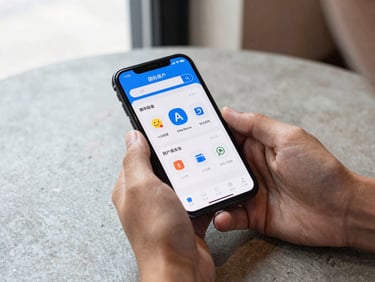 Hands holding a smartphone displaying Alipay's international user onboarding screen, concrete café table in the background, clean natural window light, no clutter