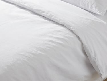 Macro texture of high-thread-count white cotton sateen bedsheets, soft shadows, bright neutral daylight, clean commercial photography