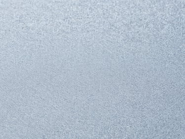 Close-up of high-quality textile weave, natural fibers, soft textures, bright neutral daylight, cool tones, sharp focus, editorial style