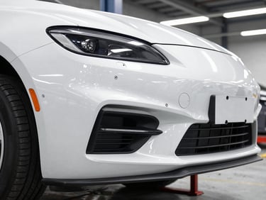 Detailed shot of a pristine OEM car fender and bumper on a rack in a clean warehouse, showcasing smooth surface and mounting points, crisp industrial lighting.