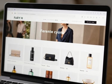 Full browser window screenshot of a clean eCommerce storefront on a light background, product grid visible with sharp product cards, natural daylight environment, high contrast showing crisp interface detail, desktop viewport