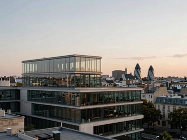 Modernist glass penthouse overlooking a historic European skyline, dusk light, clean geometric lines.