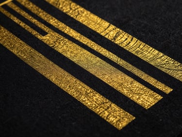 Close-up of vibrant textile printing in progress, sharp details of high-definition ink on heavy fabric, dramatic studio lighting