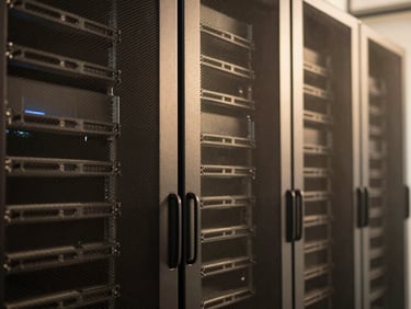 Architectural detail of a modern data center server rack, clean lines, subtle lighting, focus on precision and efficiency
