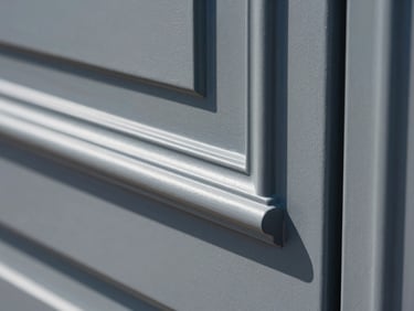 Close-up macro shot of a freshly painted door frame, bright natural daylight highlighting the smooth, flawless finish and sharp-edged transition, 35mm.