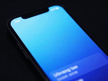 Close-up of a mobile device screen displaying a sleek utility app interface, glowing with subtle electric blue, in a dark setting, sleek tech photography, sharp focus.