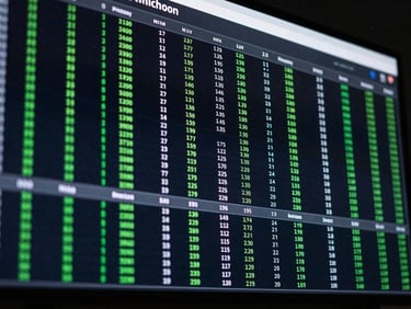 Close-up of a digital screen displaying complex hockey micro-stats, data visualization, dark mode, high contrast, green highlights, analytical style