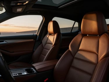 Close-up of a luxury car interior, leather seats, and dashboard details, dramatic low-key lighting, high contrast.