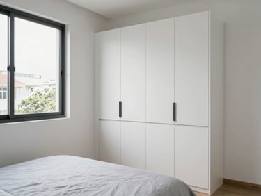 Modern apartment bedroom in Cẩm Lệ district Đà Nẵng, white walls, built-in wardrobe, natural window light, tidy and minimal