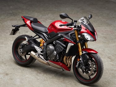 Overhead three-quarter view of a Triumph Street Triple RS on neutral concrete floor, Korosi red bodywork under hard studio strobe, exhaust system sharp, no rider