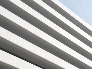 Abstract geometric representation of growth, clean white and gray architectural lines, bright daylight