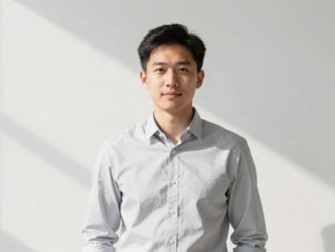 Professional portrait of a male fintech product manager, bright daylight, minimalist setting